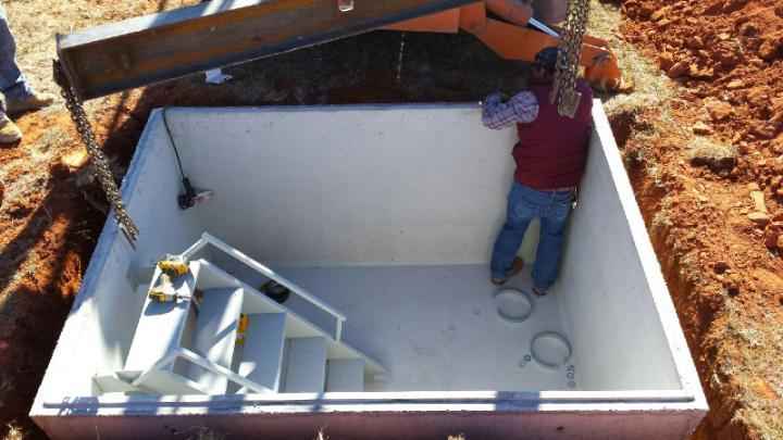 Outdoor Sloped Concrete Storm Shelter - F5 Storm Shelters of Tulsa
